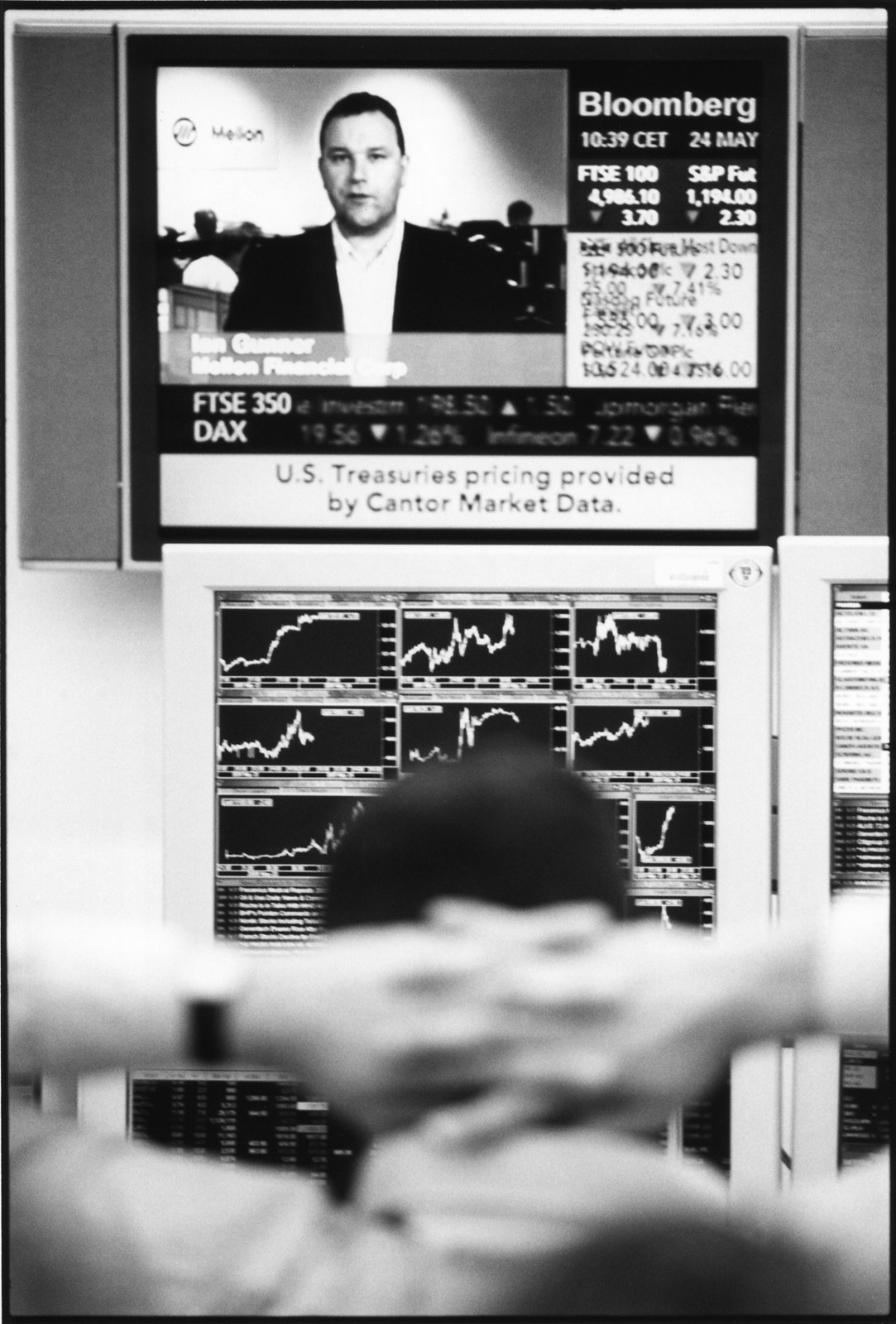 Trader in front of its bloomberg screen, London, 2005